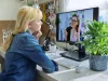 Teen girl talking online with psychologist, social worker
