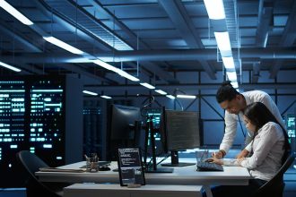 Team of specialists updating server room systems