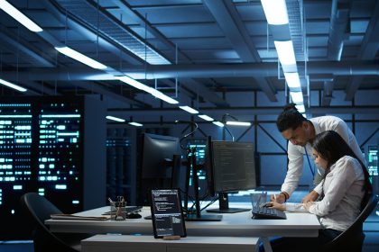 Team of specialists updating server room systems